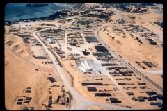 This photograph is oriented toward the south and shows the Engineer Class IV supply yard near the south beach at Cam Ranh Bay.