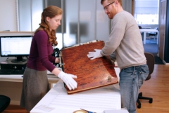 Lab Technicians Curating Large Artifacts